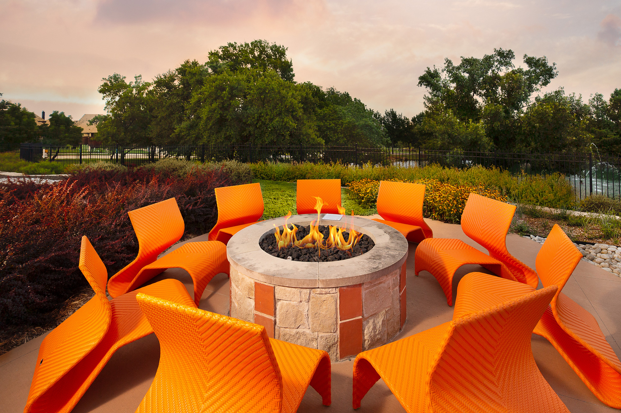 Get cozy around the community's fire pit at The Haven.